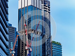 SINGAPORE Ã¢â¬â 13 APR 2019 Ã¢â¬â High-rise building cranes in SingaporeÃ¢â¬â¢s Tanjong Pagar Central Business District CBD with copy photo